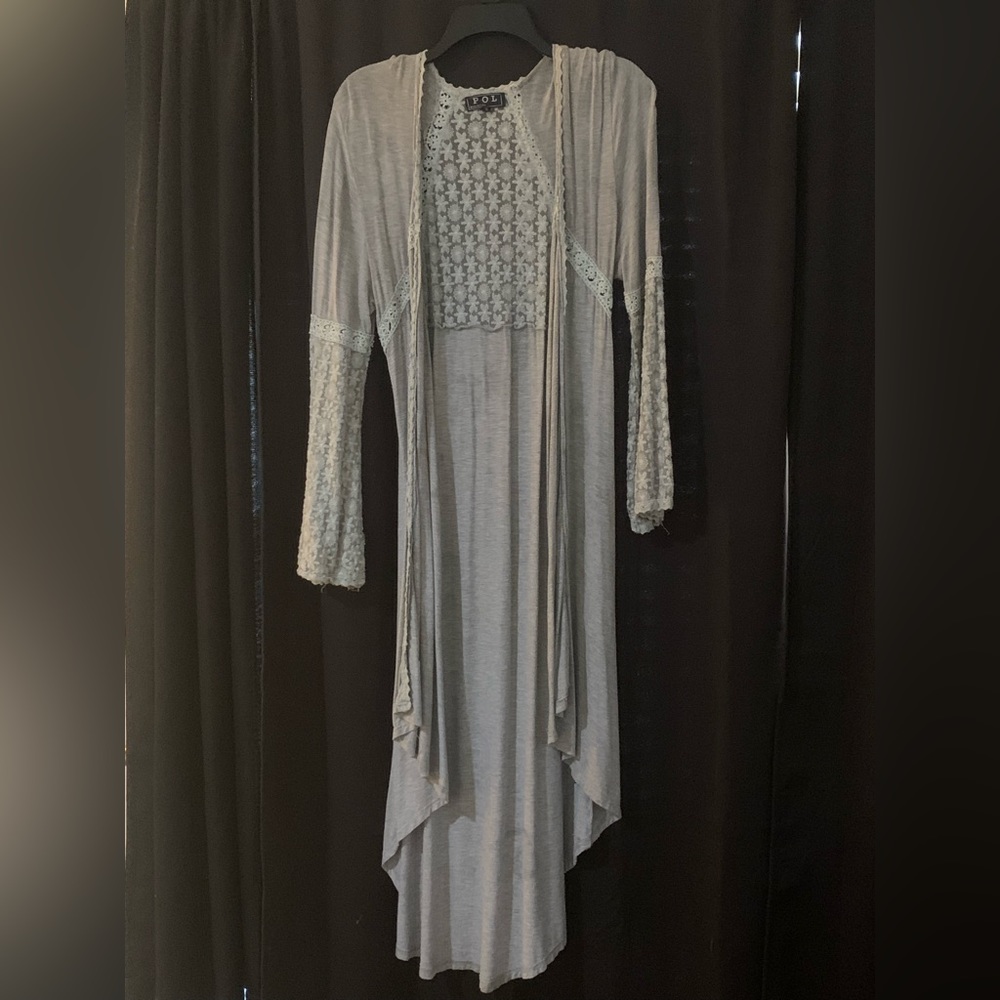 POL crocheted quarter length shawl.